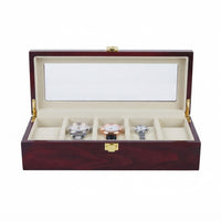Boîte à Montres 5 Compartiments – Palais-Royal, vue de face sur fond clair, finition bois laqué bordeaux, avec montres