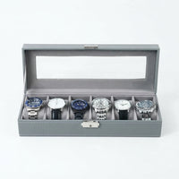 Boîte à Montres 6 Compartiments – Cluny, vue de face sur fond clair, finition Gris Perle, avec montres